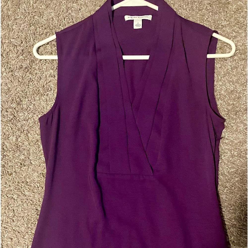 Banana Republic brand. Woman’s size 2.  This is 100% polyester.  Bright purple!
